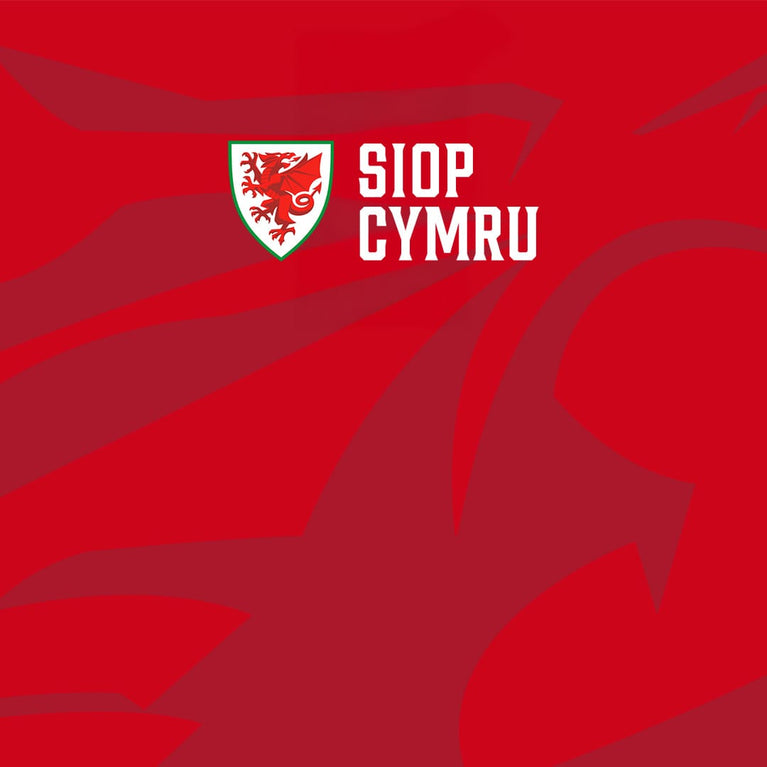 Red graphic design featuring the Welsh national team crest on the left and the white text 'SIOP CYMRU' on the right, with abstract red shadow-like shapes in the background.